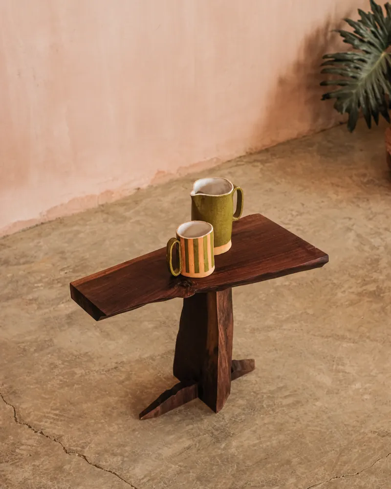 NK.01 side table in solid walnut on a crossed base