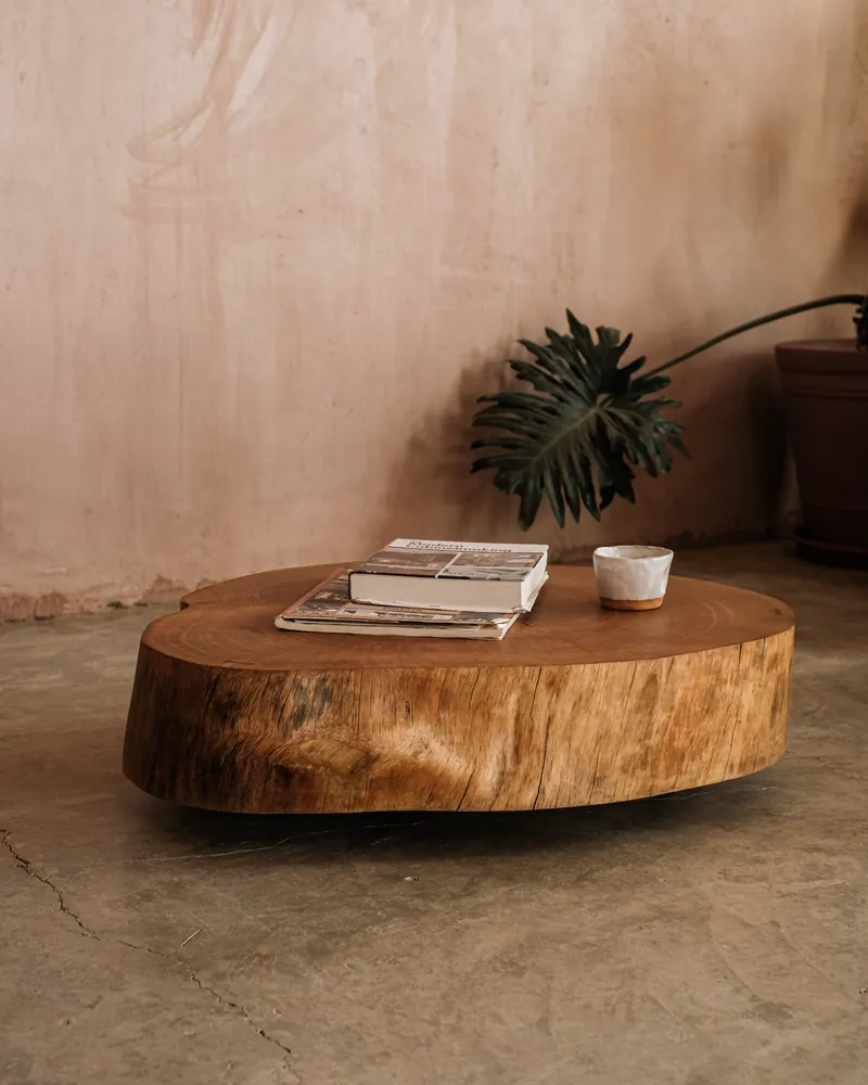 Floating low table in solid ash on hidden wheels